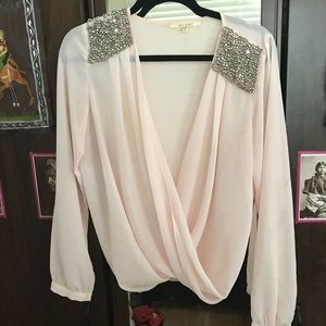 Sheer blush blouse with detail on shoulders